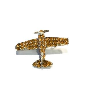 Vintage orange rhinestone plane brooch